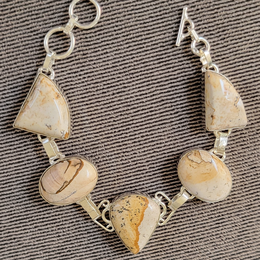 Elegant Silver and Cream Stone Bracelet